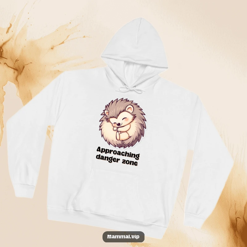Funny hedgehog hoodie featuring a lovable hedgehog character in a compact ball shape, offering maximum coziness and humorous appeal for chilly days.