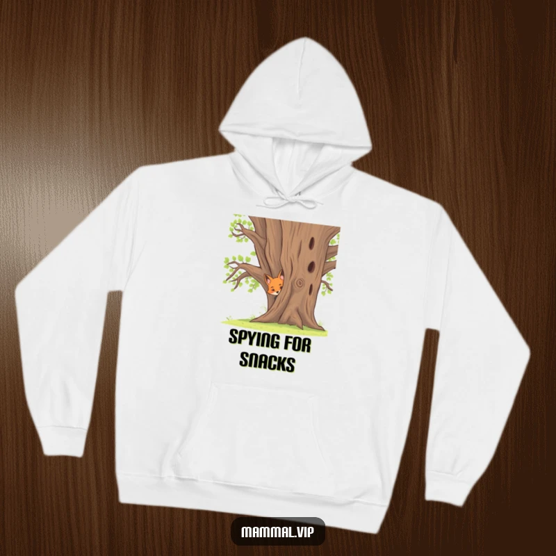 Funny hoodie featuring a charming fox kit peeking curiously from behind a large oak tree, ideal for cozying up with.