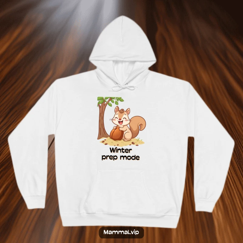 Funny Hoodie showing a happy squirrel character diligently burying a giant acorn, symbolizing preparedness and abundance.