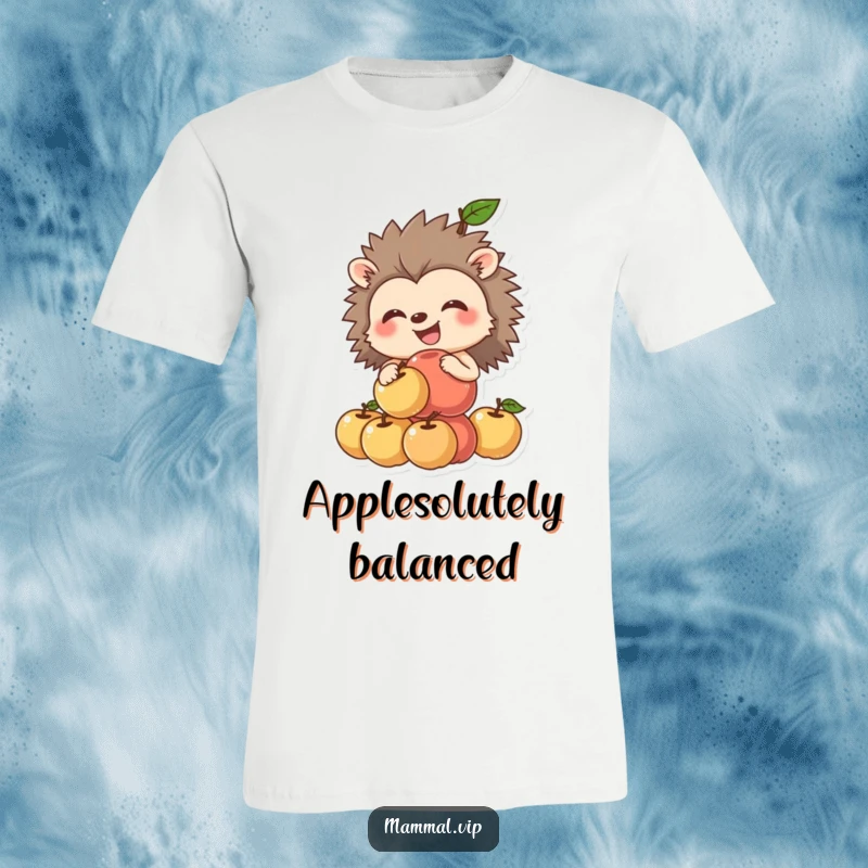 Funny hedgehog t-shirt with a grinning hedgehog attempting to balance a wobbly tower of apples, highlighting adorable clumsiness.